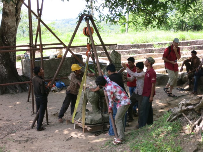 This statue was being relocated to a museum. Note the primitive equipment being used for moving this extremely heavy relic.